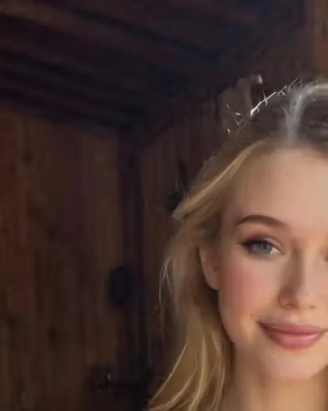 Close-up portrait of an adult AI-generated woman with short light hair